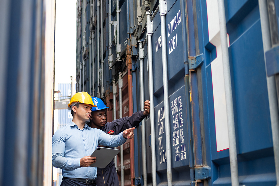 Two workers of freight forwarding companies